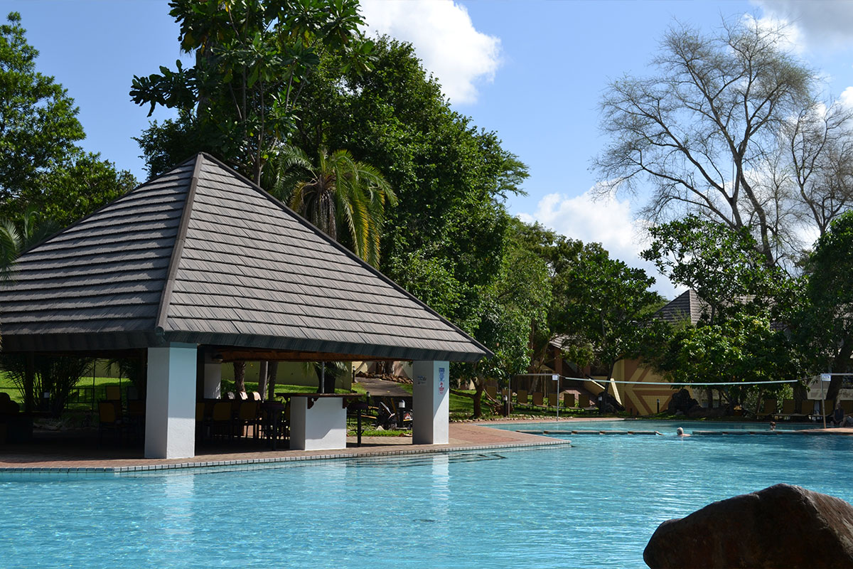 Nestled at the confluence of the Sabie and Sand Rivers, Sanbonani is in the heart of the Bushveld. Luxurious chalets overlook the tranquil rivers where hippos splash and crocodiles soak up the sun on the banks of the river bed, or spend time in one of the  chalets  where you can enjoy  the sound of the beautiful man made stream.